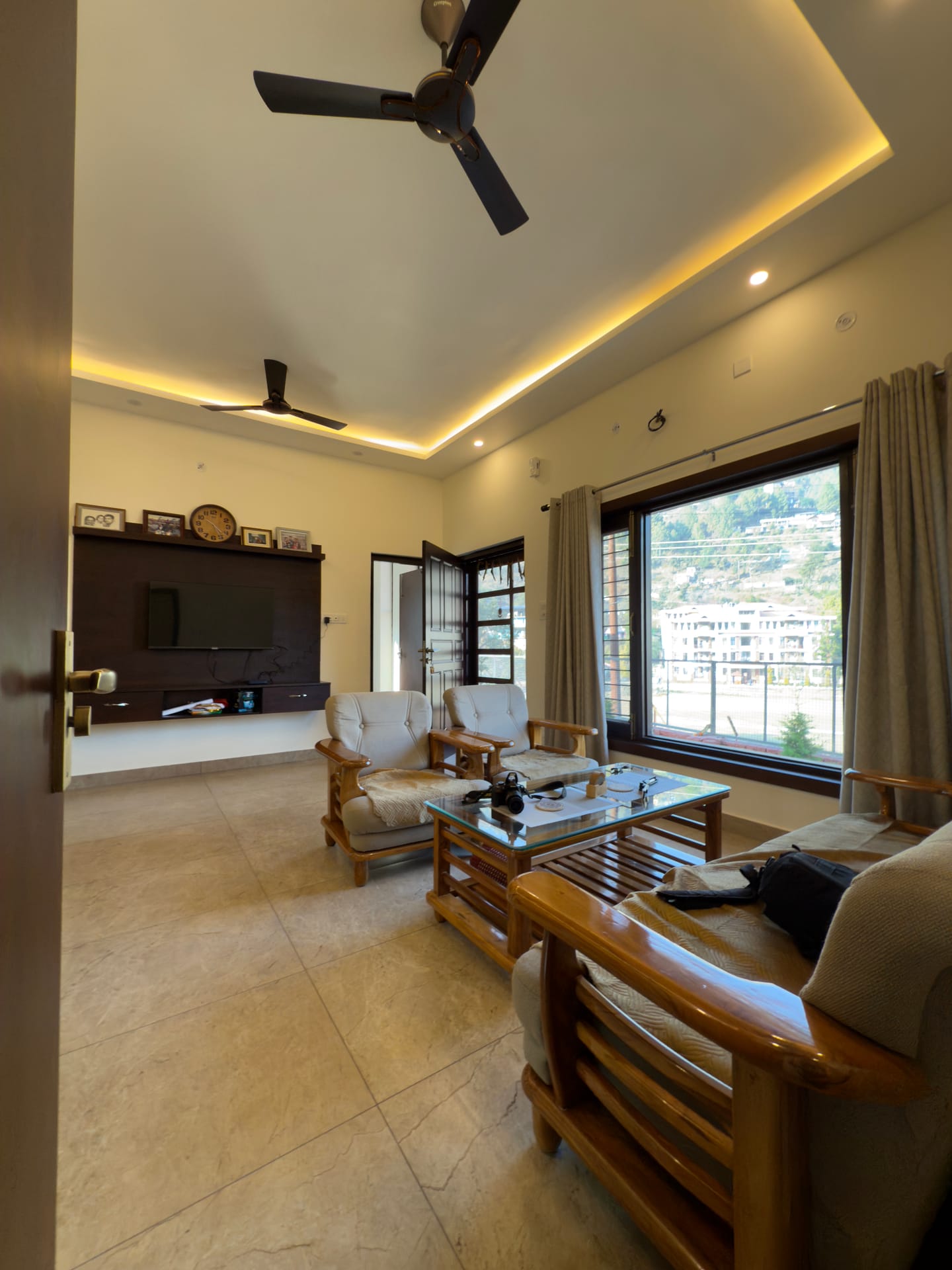 Villa complex with mountain backdrop